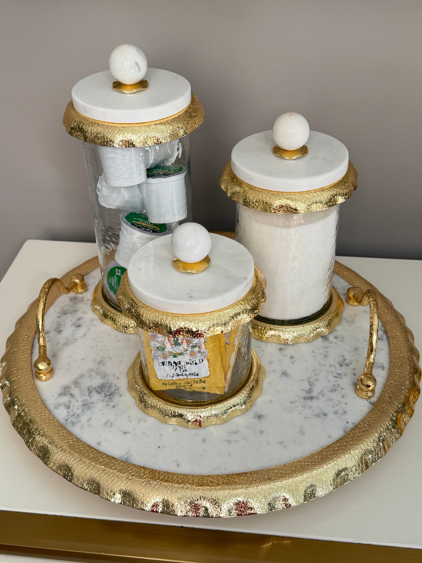 Set Of 3 Glass Canisters Whit Marble And Gold Lid .