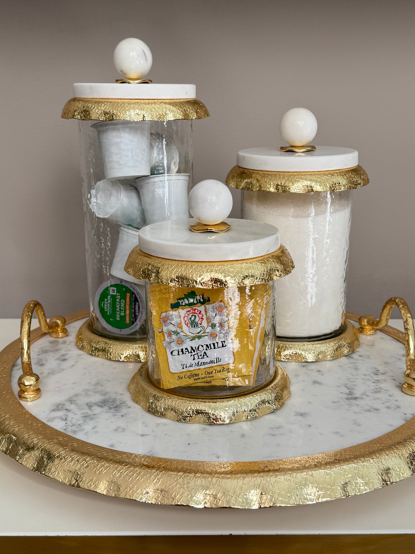 Set Of 3 Glass Canisters Whit Marble And Gold Lid .