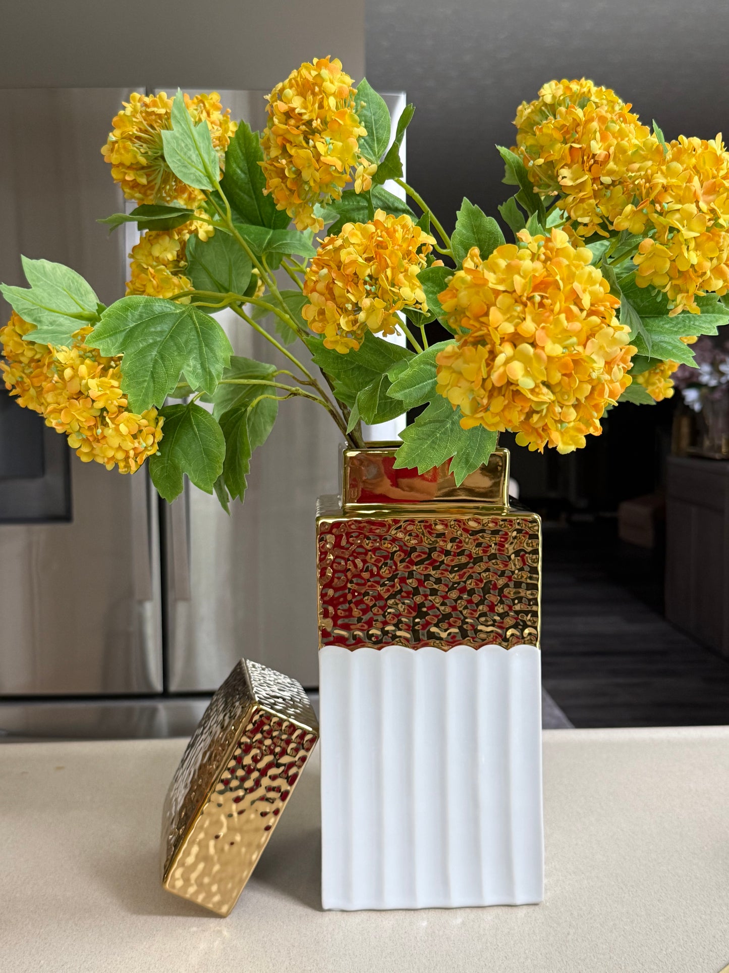 Gold and White Vase With Lead.