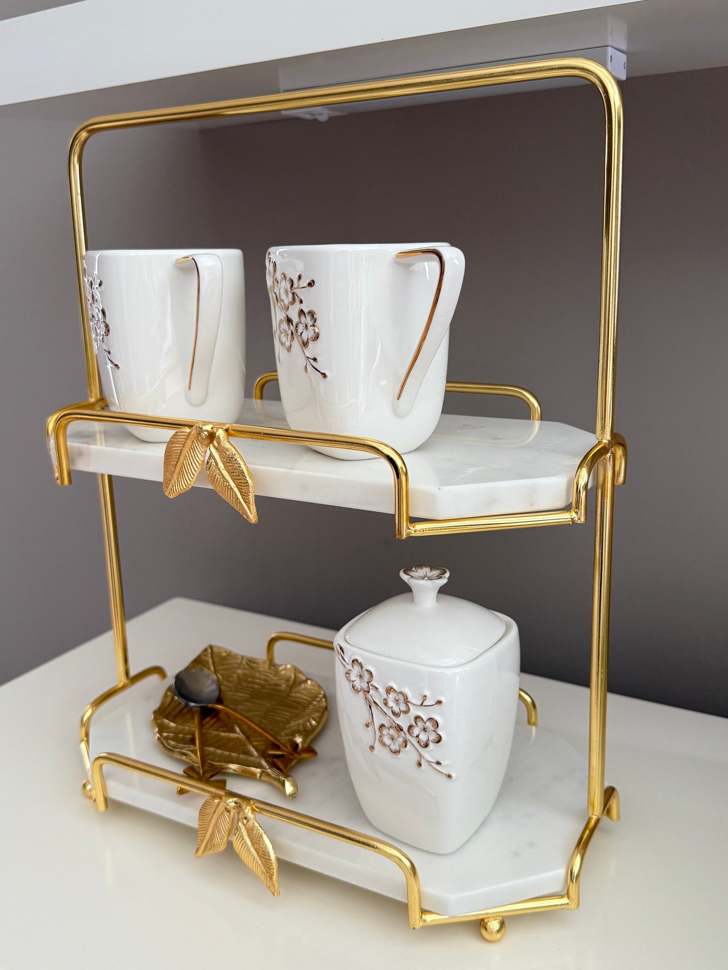2 Tier Marble And Gold Leaf Design.