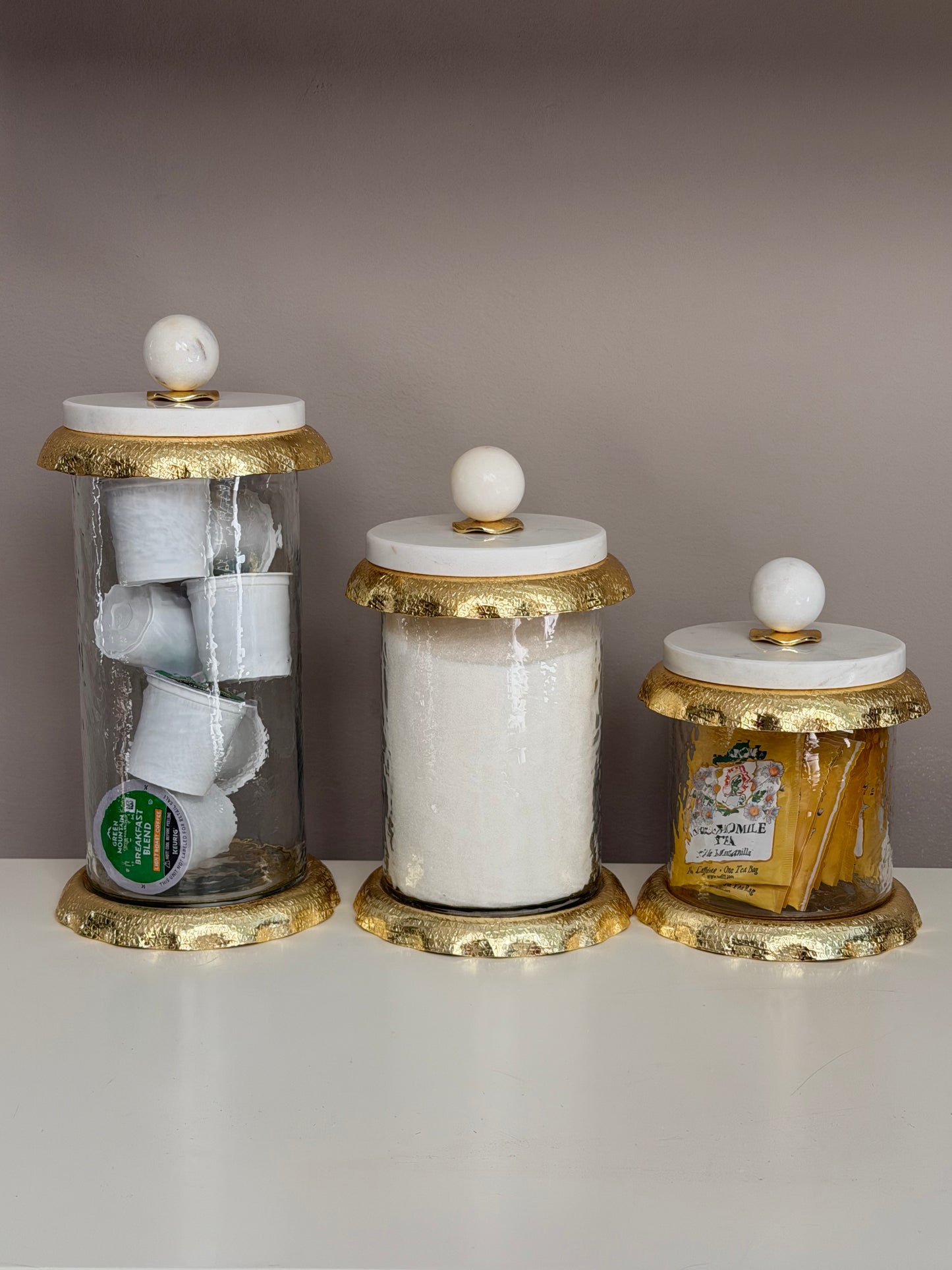 Set Of 3 Glass Canisters Whit Marble And Gold Lid .