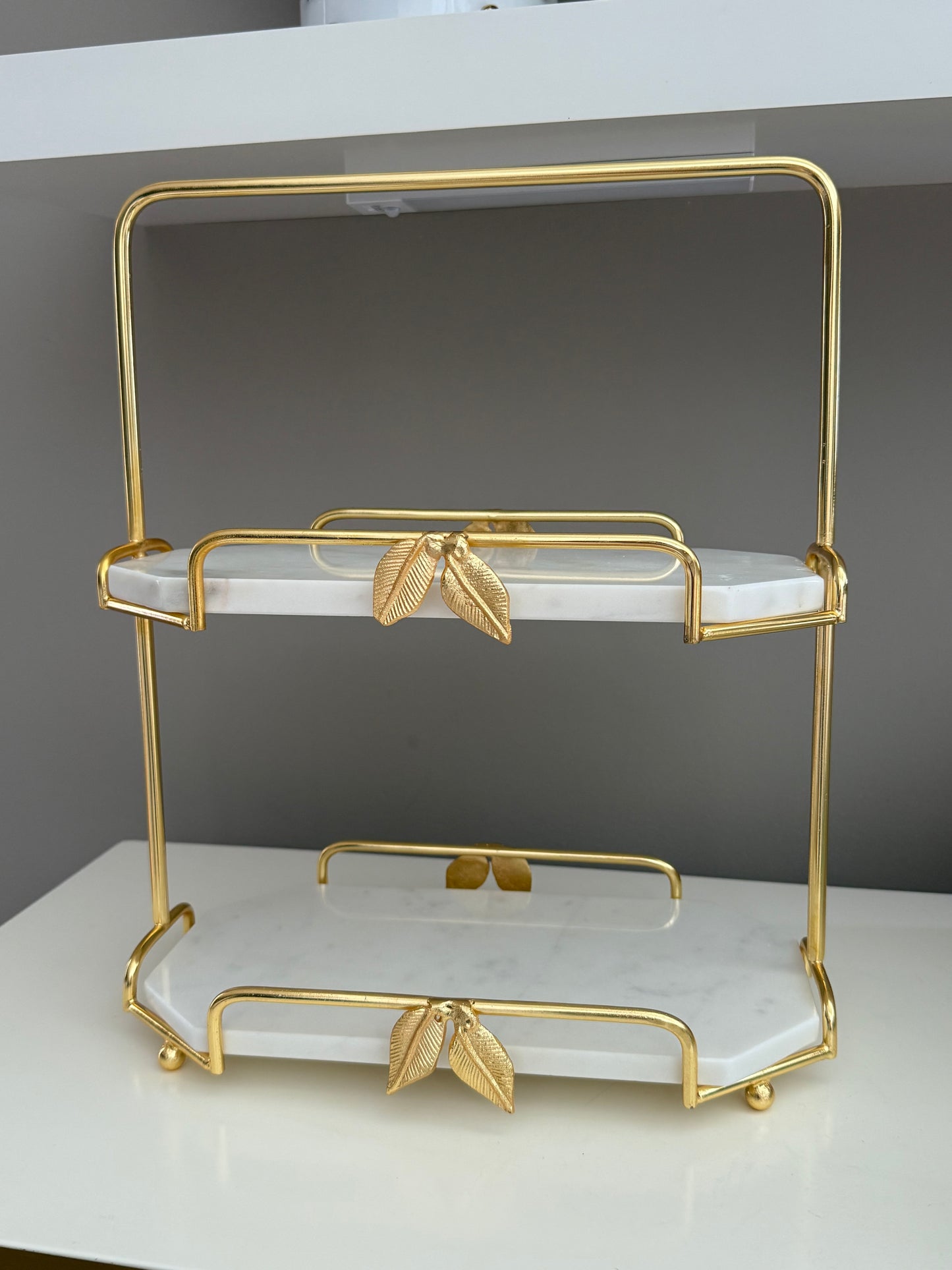 2 Tier Marble And Gold Leaf Design.