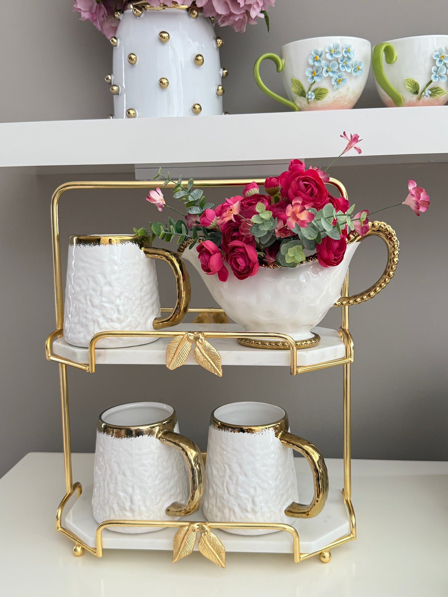 2 Tier Marble And Gold Leaf Design.