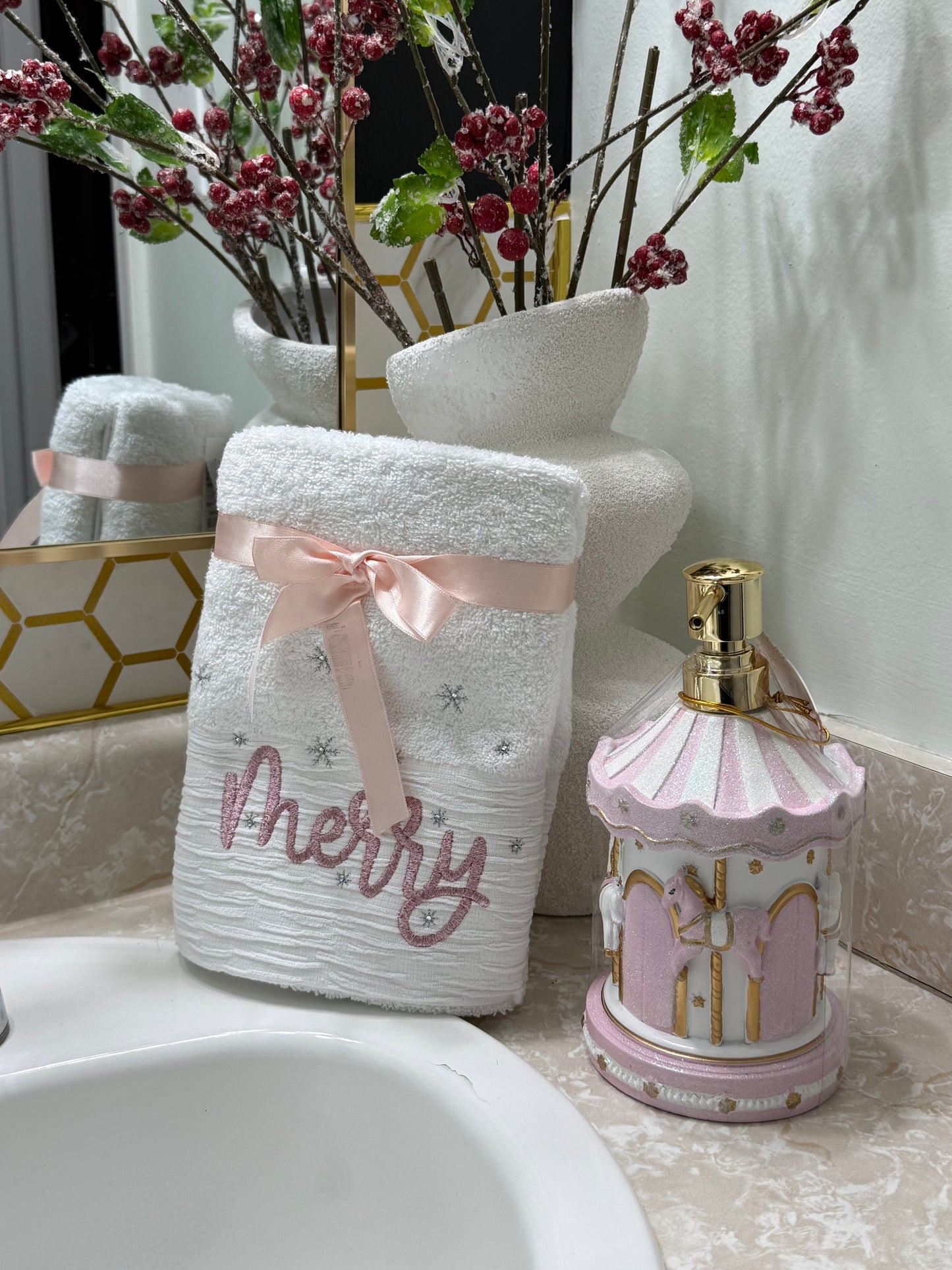 White Bathrooms Hand Towels Embroidered whit The Word Merry.