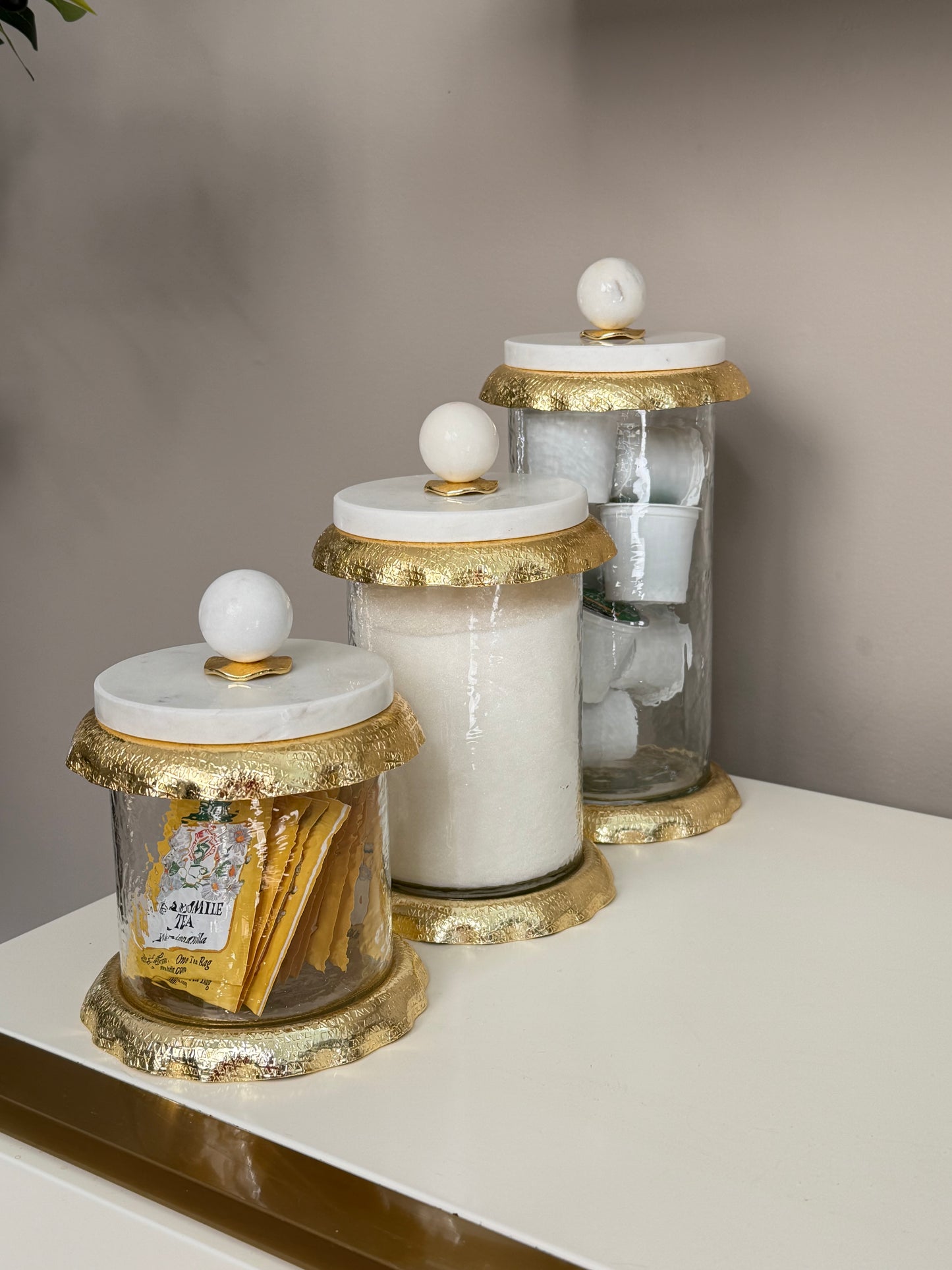 Set Of 3 Glass Canisters Whit Marble And Gold Lid .