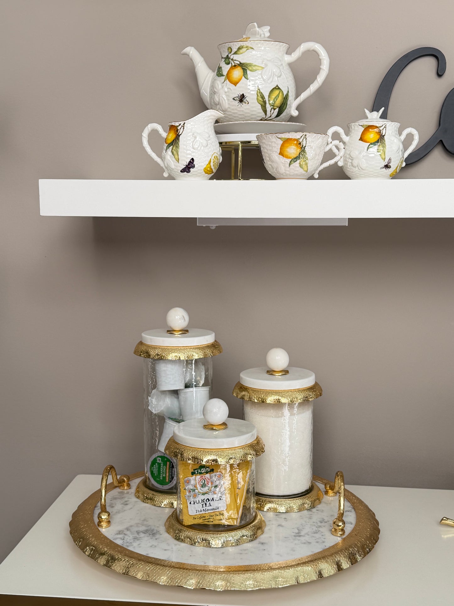 Set Of 3 Glass Canisters Whit Marble And Gold Lid .