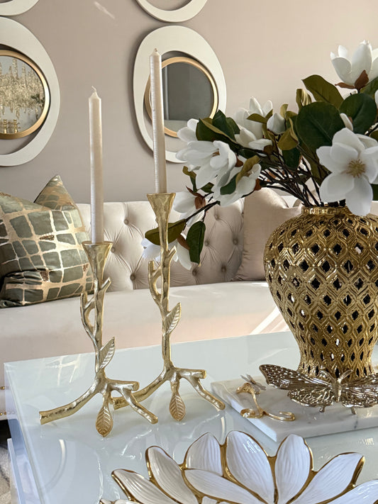 Set of two Candlesticks with Gold Leaf Design.