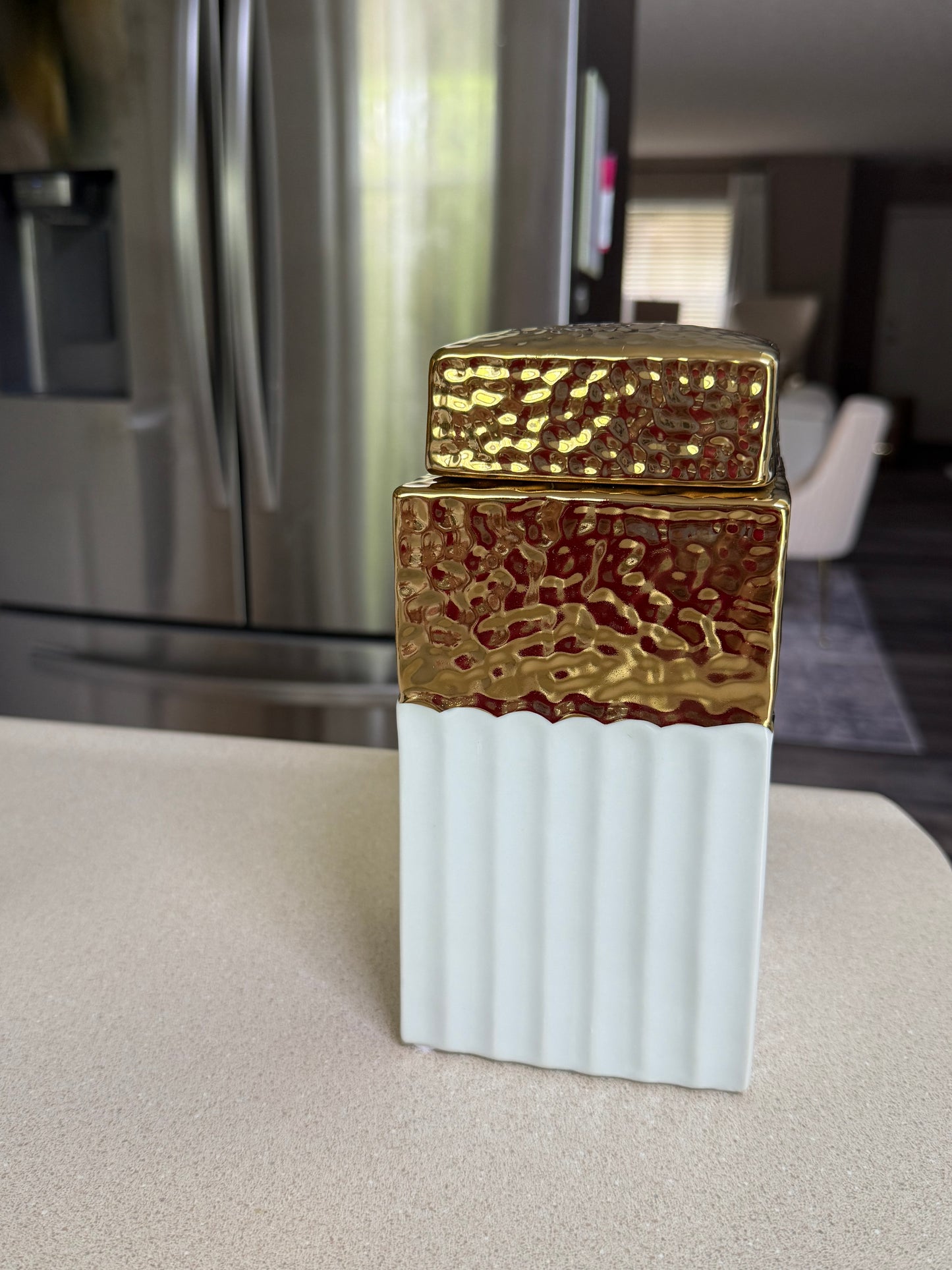 Gold and White Vase With Lead.